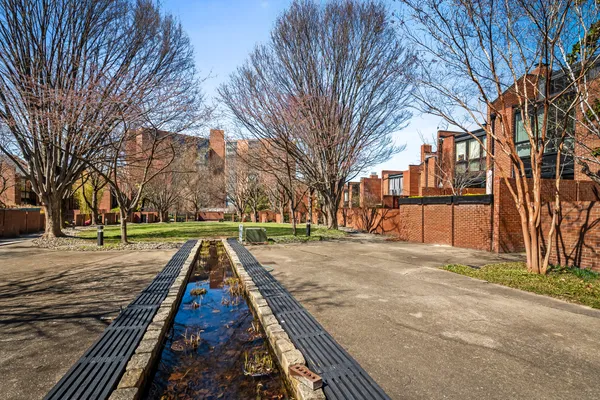 a view of a building with a yard
