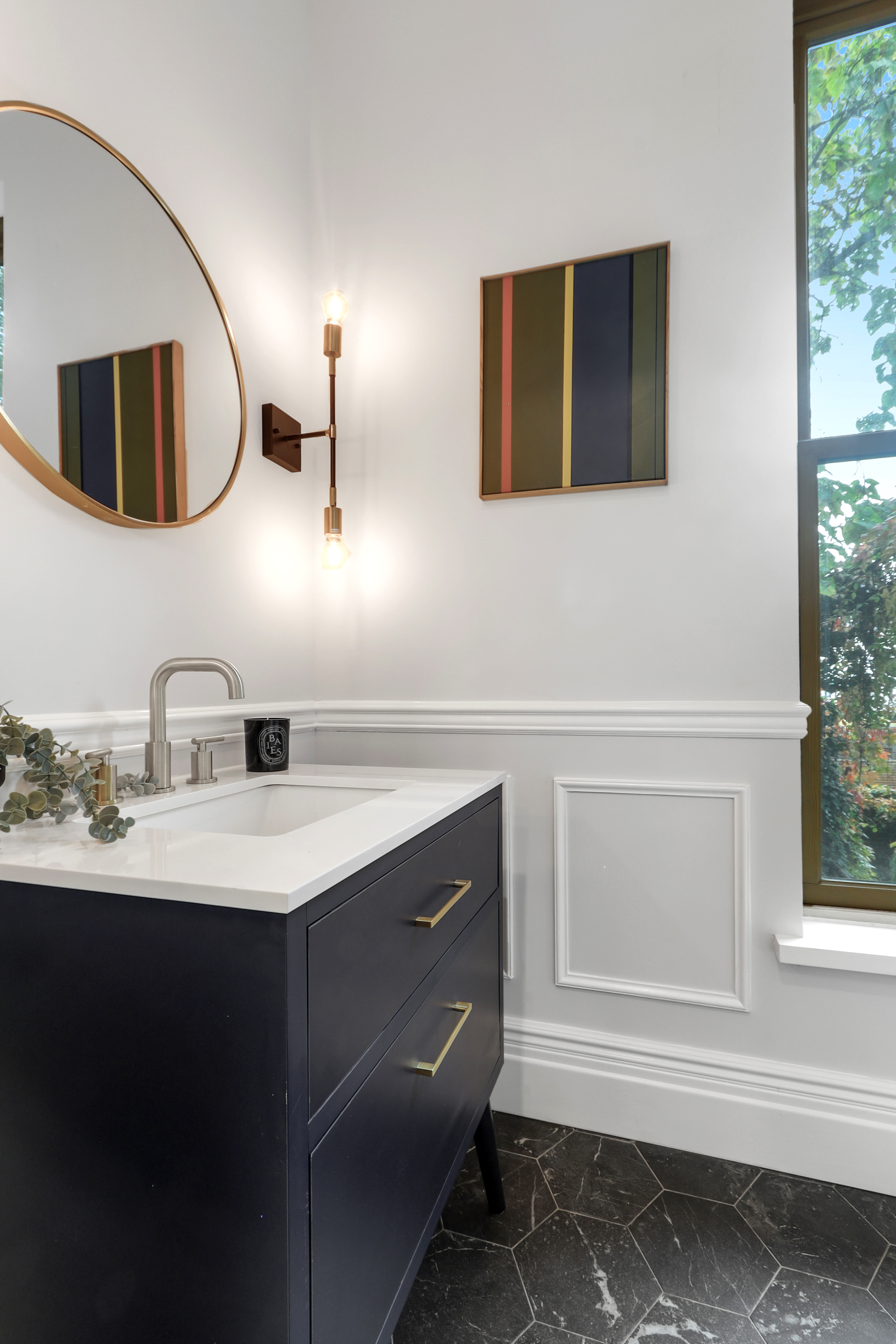 220 Lewis Avenue Brooklyn, NY 11221 - Photo 11 of 22 a bathroom with a sink and a mirror