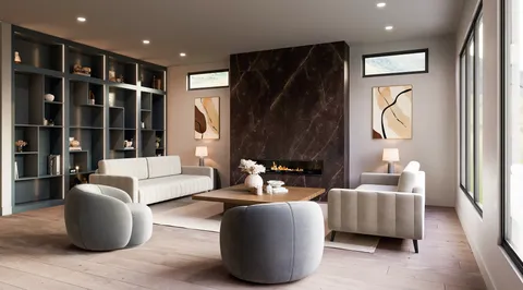 a view of an empty room with a fireplace and a window