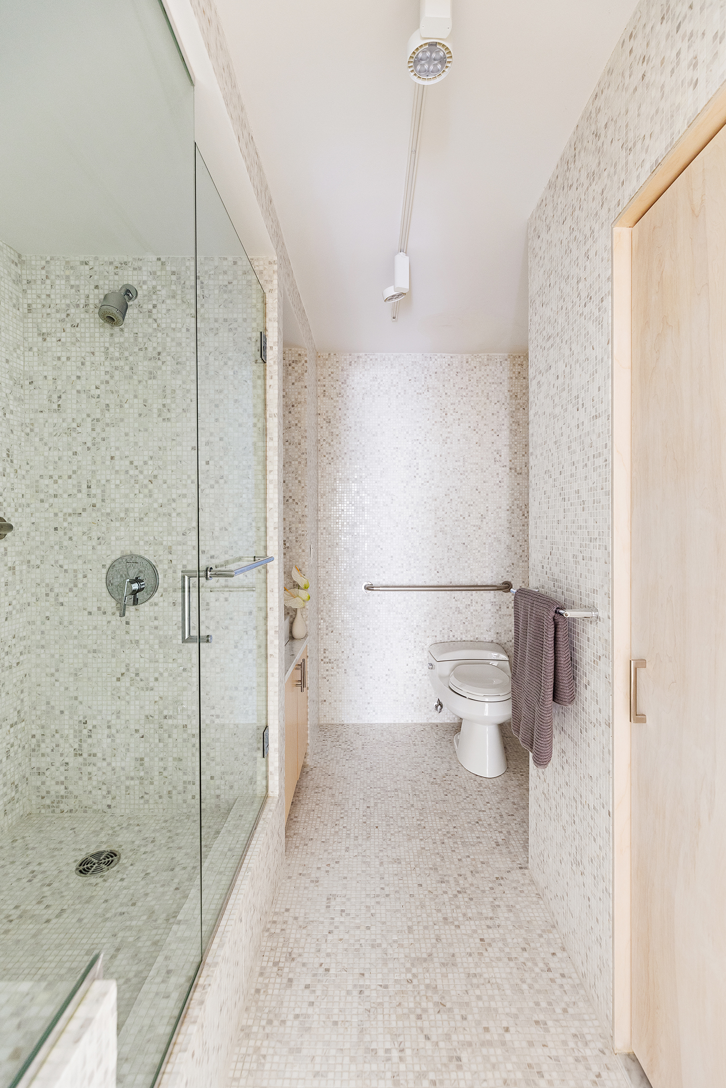 1065 Park Avenue, Unit 5BC Manhattan, NY 10128 - Photo 12 of 16 a bathroom with a shower and a toilet