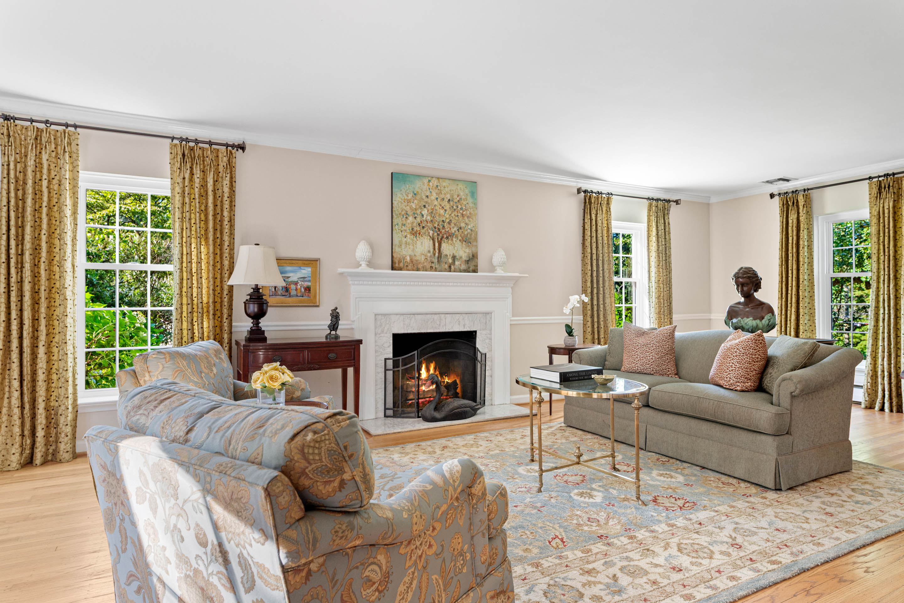 710 South Valley Forge Road Devon, PA 19333 - Photo 16 of 47 a living room with furniture a large window and a fireplace