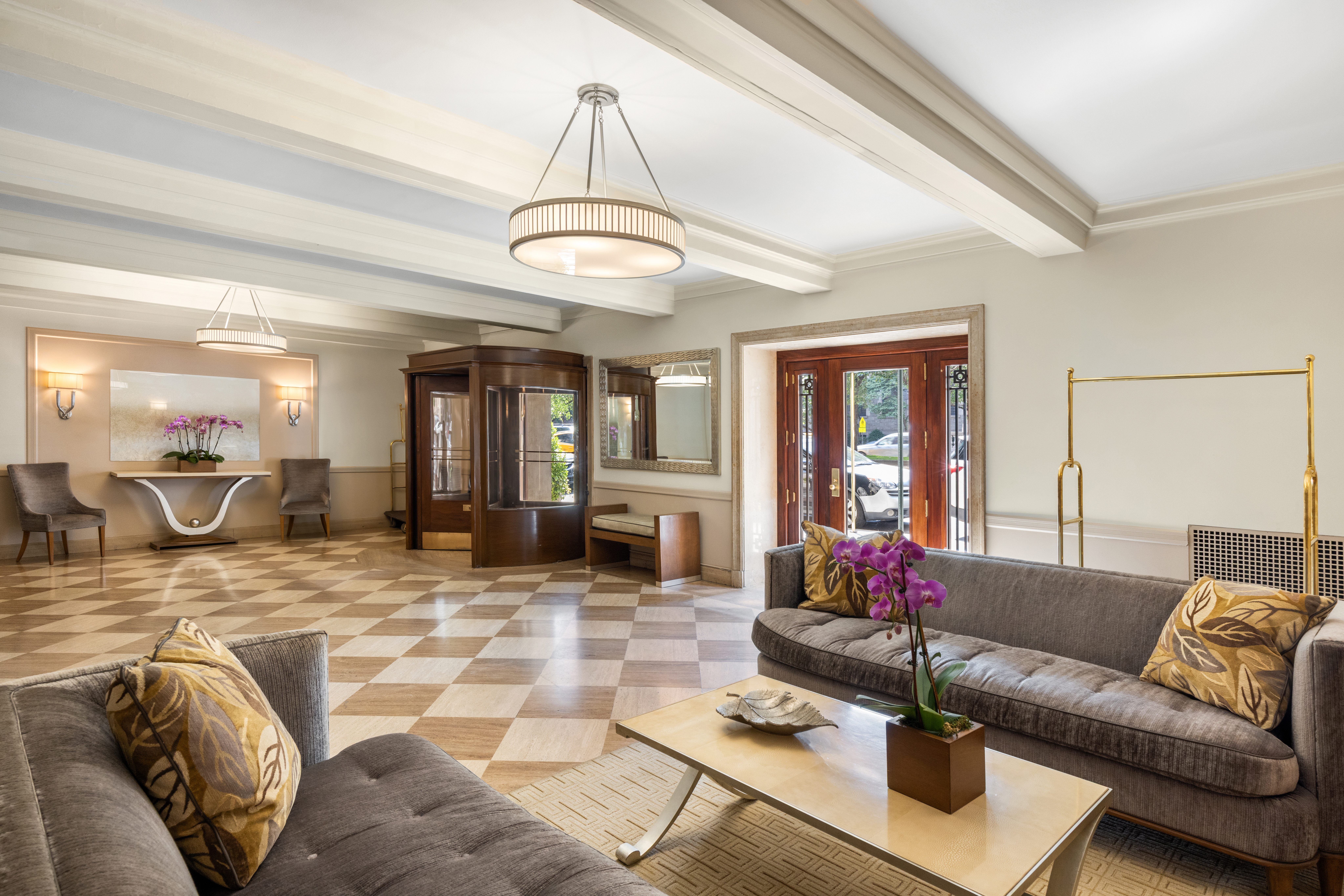 993 Park Avenue, Unit 4C Manhattan, NY 10028 - Photo 13 of 15 a living room with furniture and wooden floor