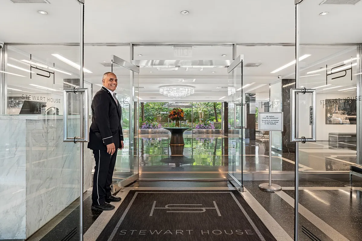 70 East 10th Street, Unit 4V Manhattan, NY 10003 - Photo 18 of 26 a view of a glass door with a glass door