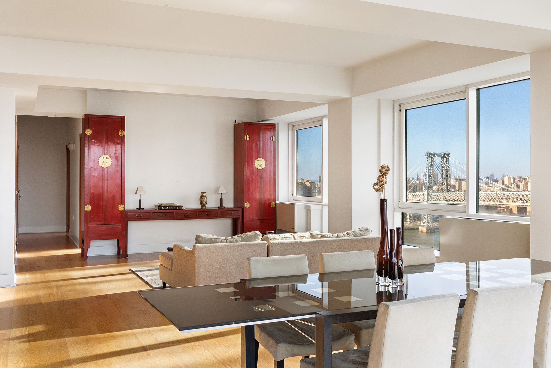 440 Kent Avenue, Unit 22C Brooklyn, NY 11249 - Photo 2 of 14 a living room with furniture and a table