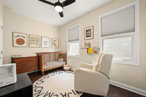 a bedroom with furniture and a window