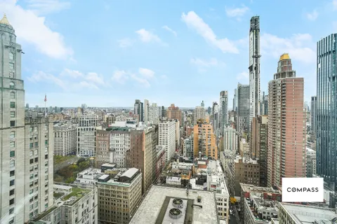 a view of a city with tall buildings