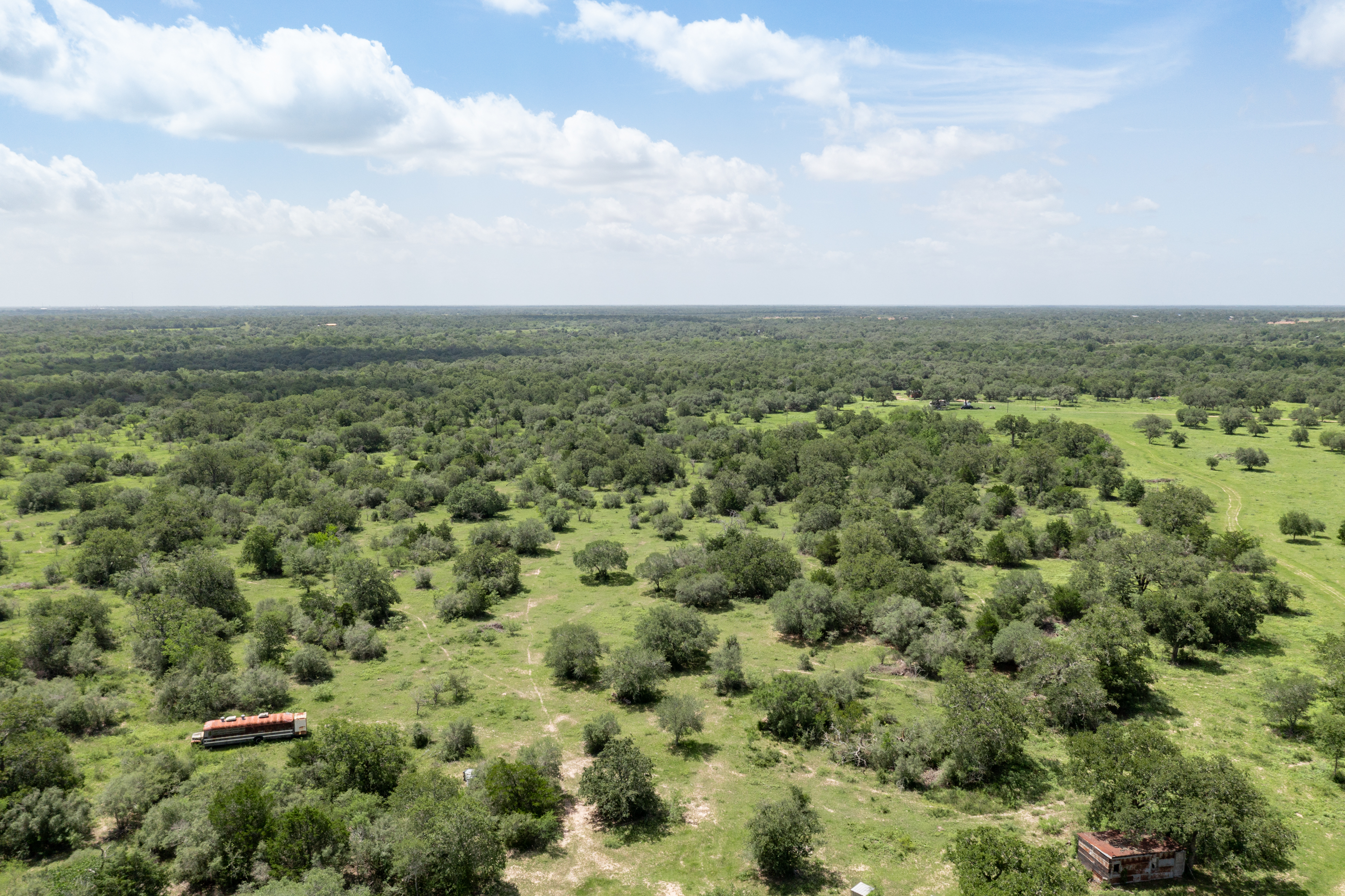 54.68 Cattle Guard Road Cuero, TX 77954 - Photo 61 of 67 an aerial view of houses covered in trees