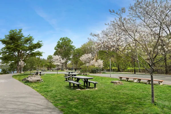 a picture of a book and a white bed