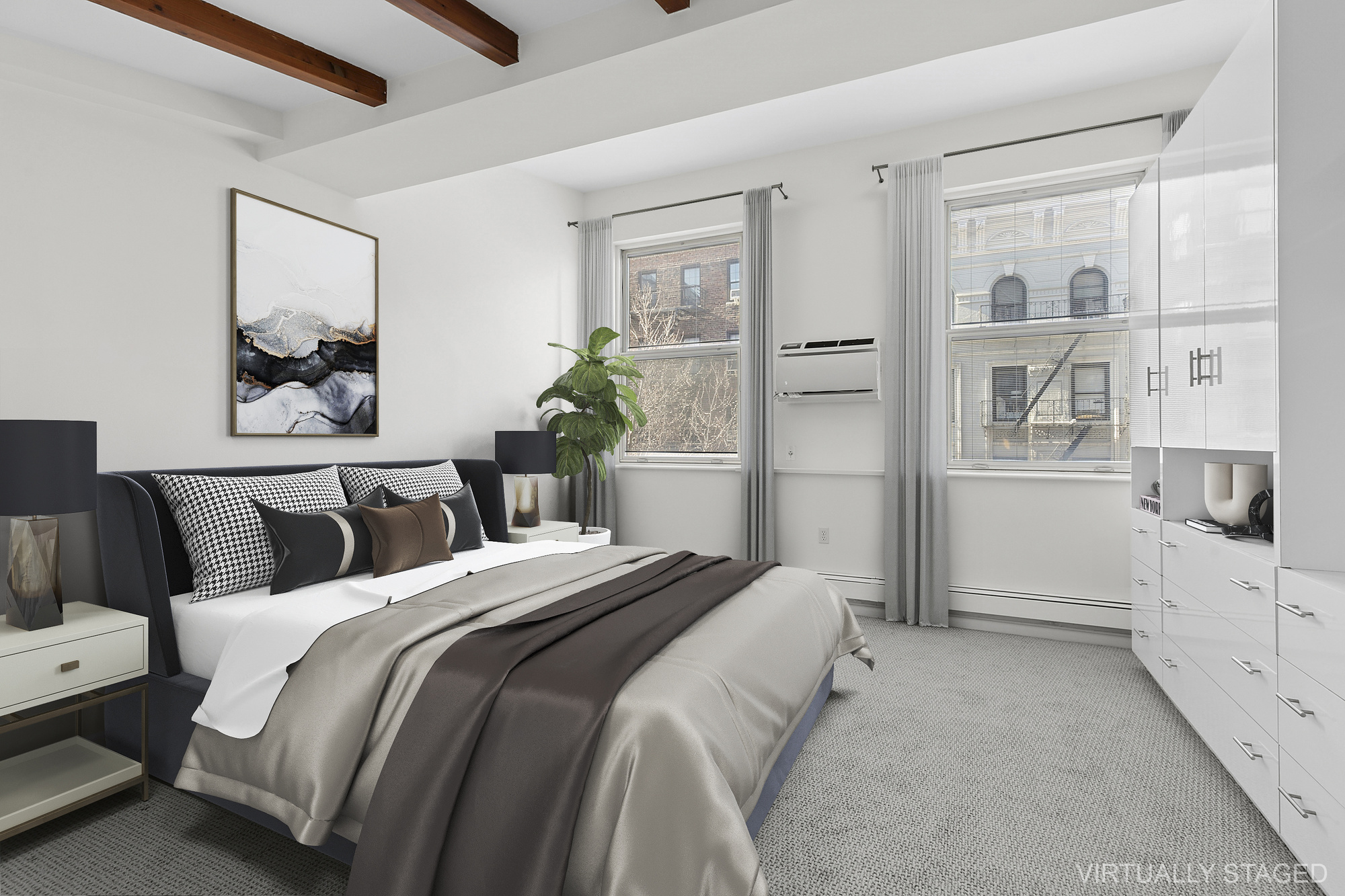 215 West 22nd Street, Unit 2 Manhattan, NY 10011 - Photo 3 of 8 a spacious bedroom with a bed and a cabinets