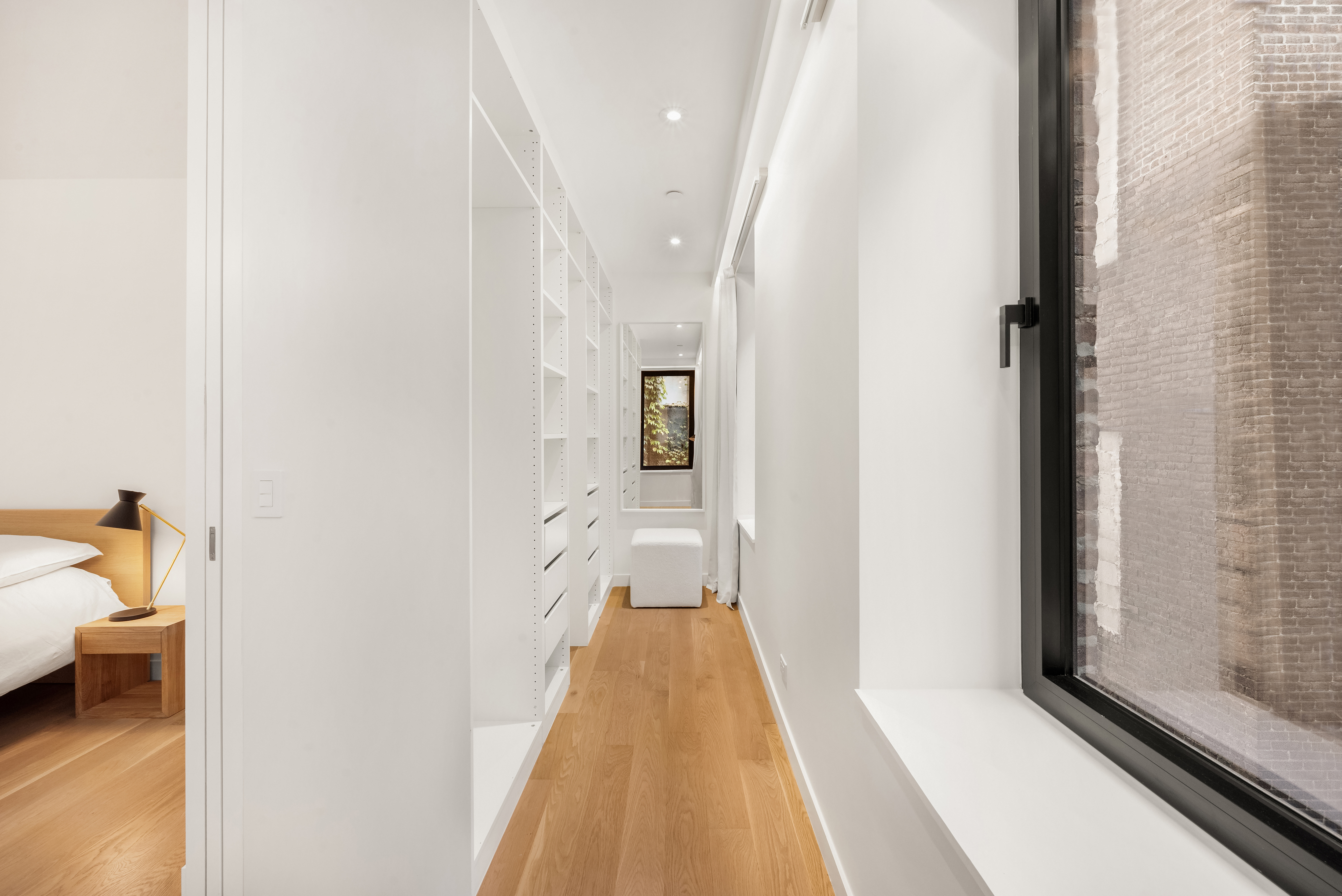 479 Washington Street, Unit 4 Manhattan, NY 10013 - Photo 6 of 8 a view of a bedroom from a hallway