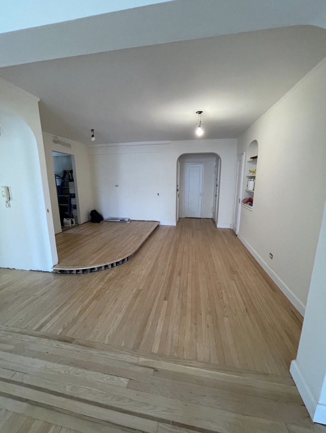 69-40 Yellowstone Boulevard, Unit 510 Queens, NY 11375 - Photo 4 of 11 a view of a livingroom with a staircase