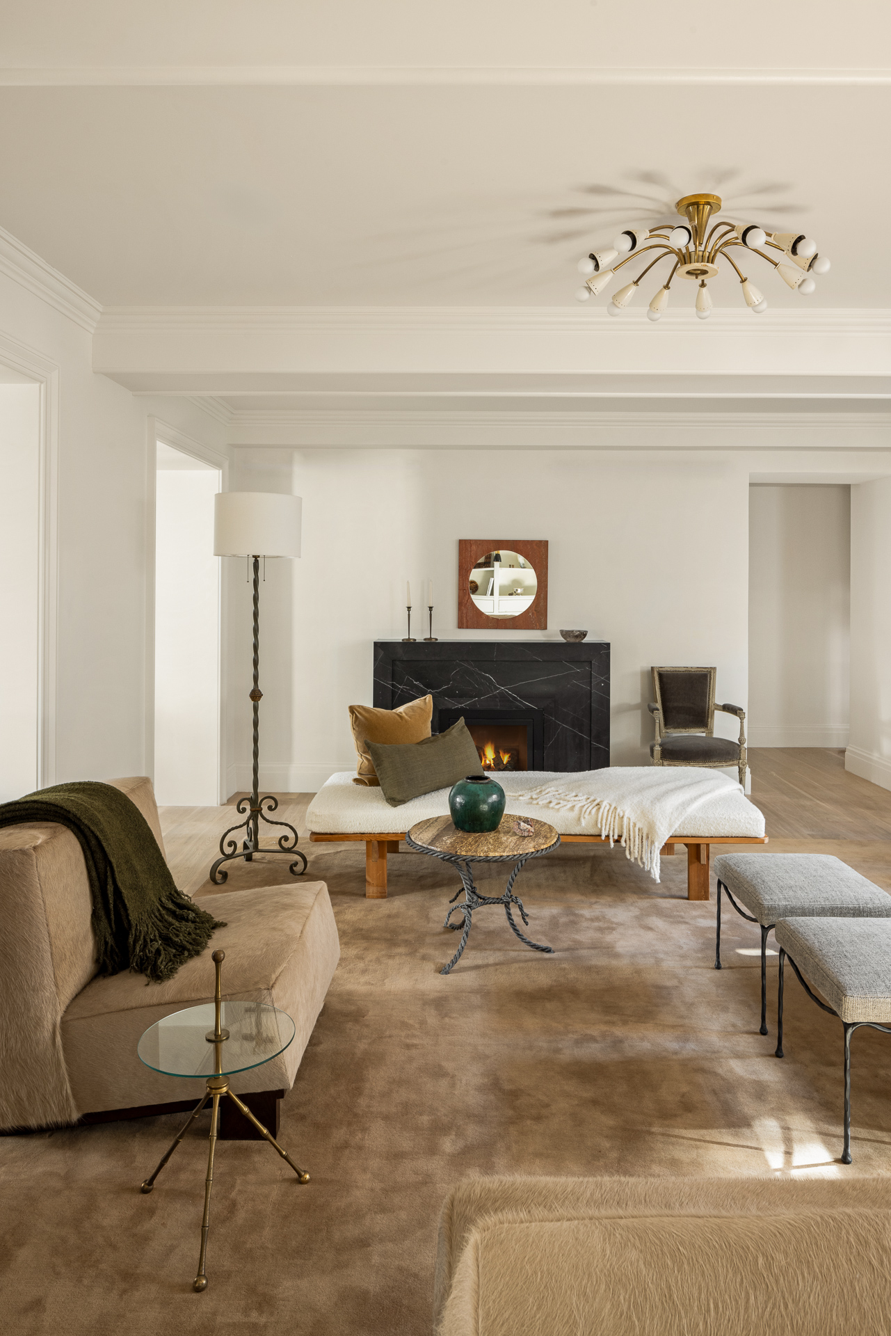 118 West 13th Street, Unit 4 Manhattan, NY 10011 - Photo 3 of 21 a living room with furniture and a fireplace