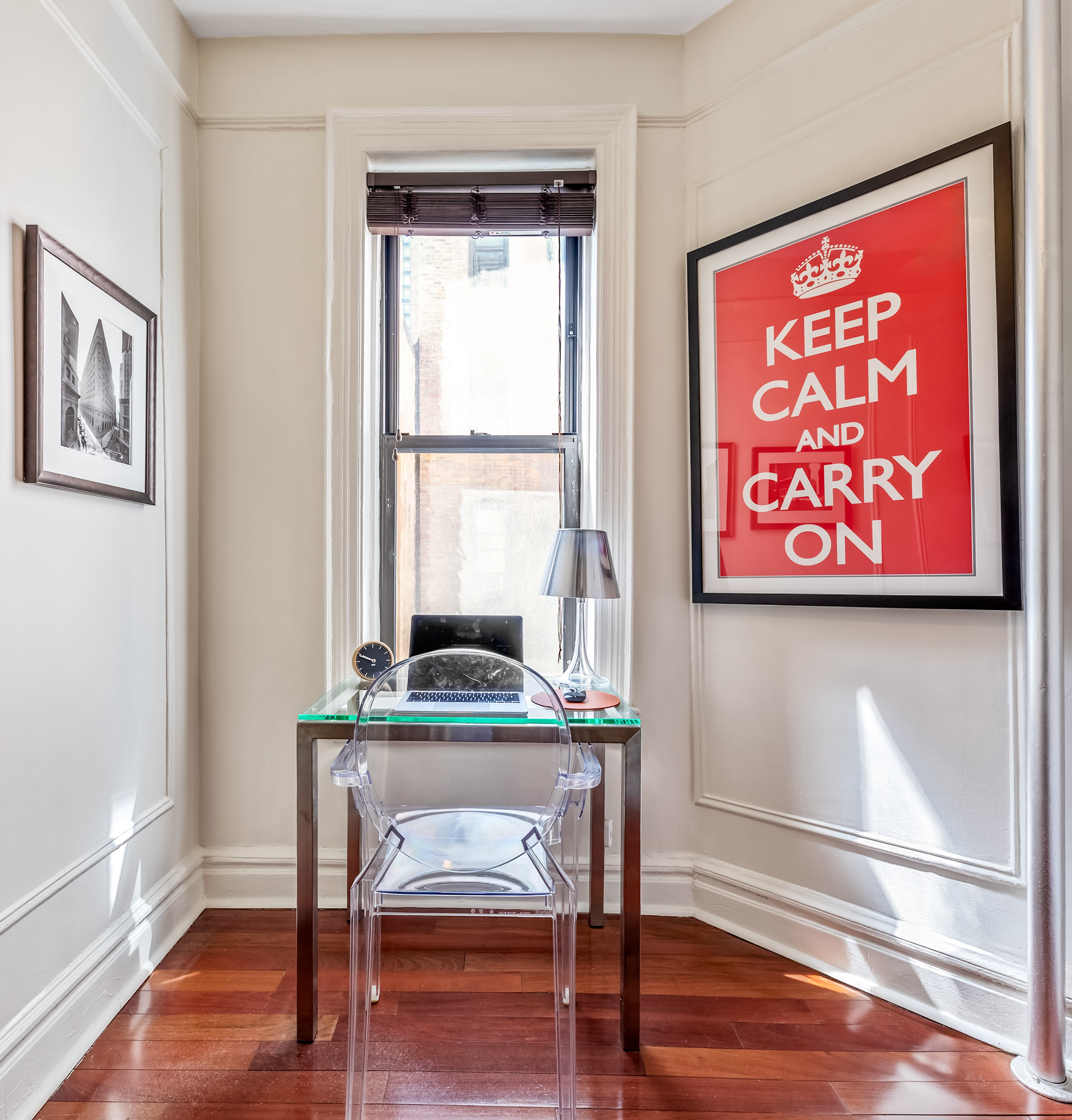 411 West 44th Street, Unit 13 Manhattan, NY 10036 - Photo 5 of 8 a room with furniture and a window