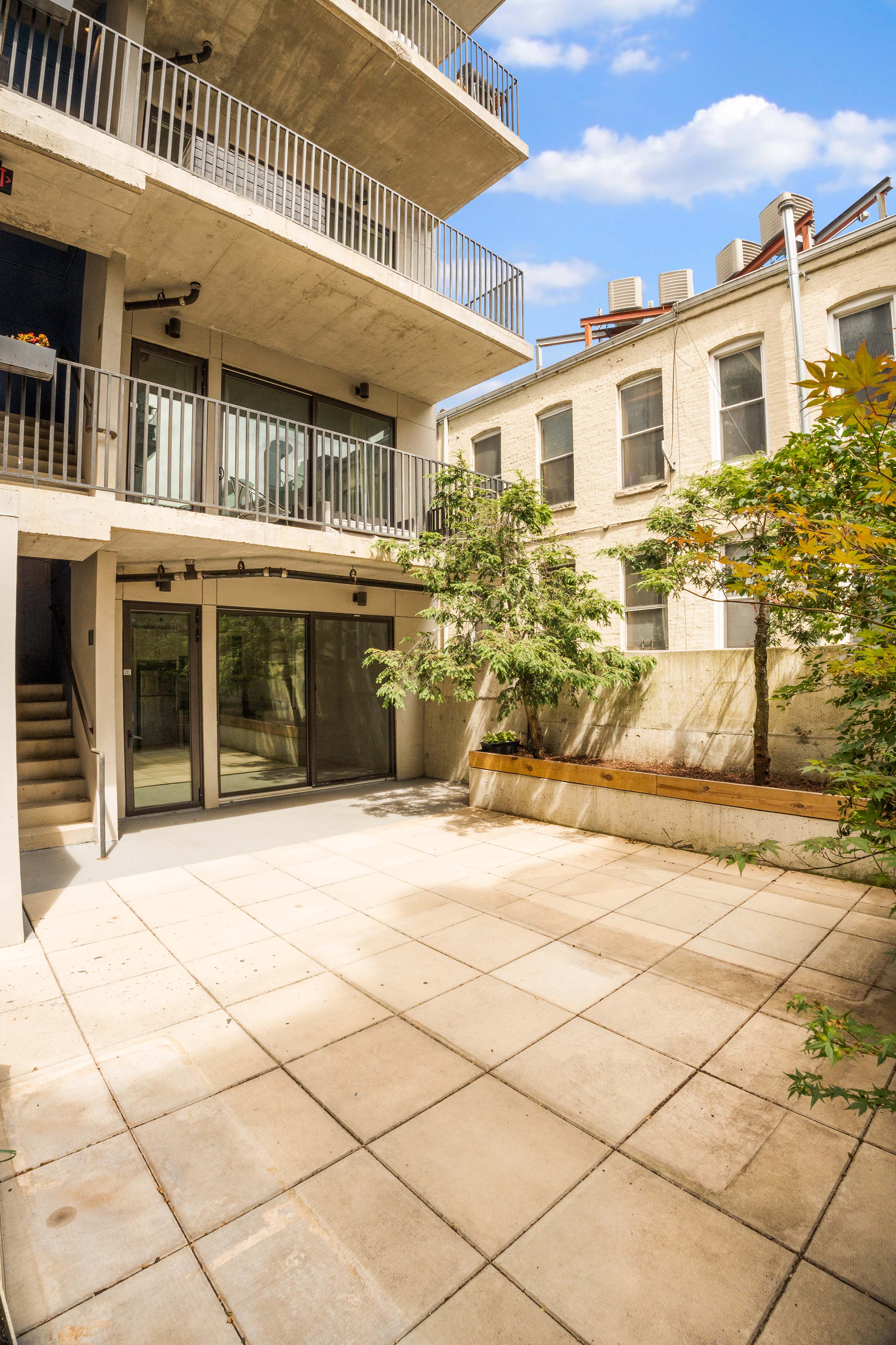 293 Hawthorne Street, Unit 2D Brooklyn, NY 11225 - Photo 9 of 20 a view of a building with a bench