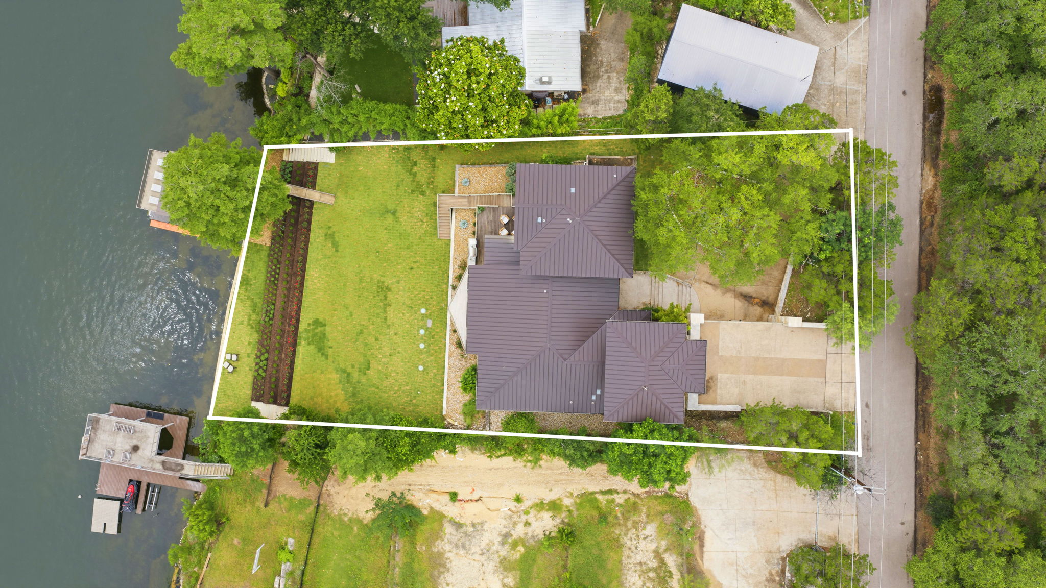 3605 Robbins Road Austin, TX 78730 - Photo 48 of 51 an aerial view of a house with a yard