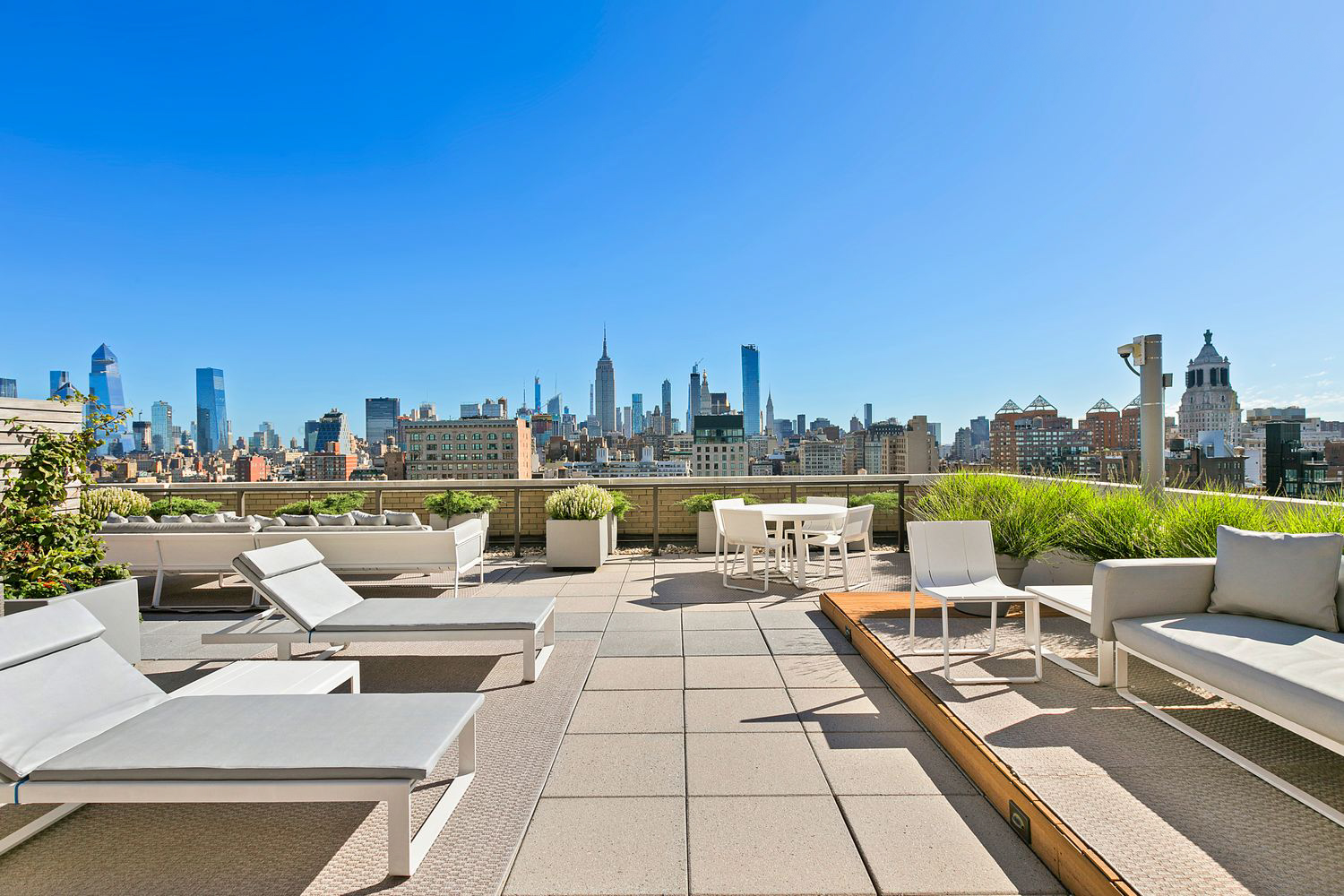 20 East 9th Street, Unit 22C Manhattan, NY 10003 - Photo 17 of 21 a view of swimming pool with seating space and city view