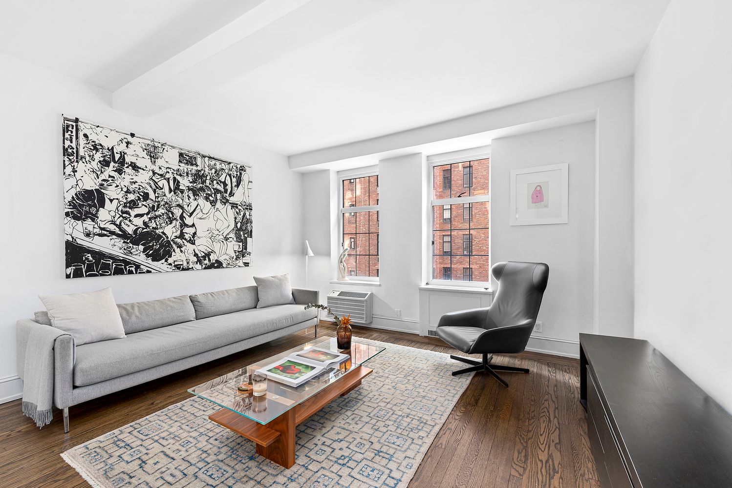 a living room with furniture and a window