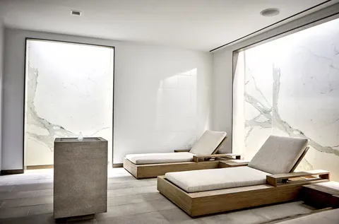 a living room with furniture and floor