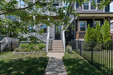 a view of a pathway of the house front of house
