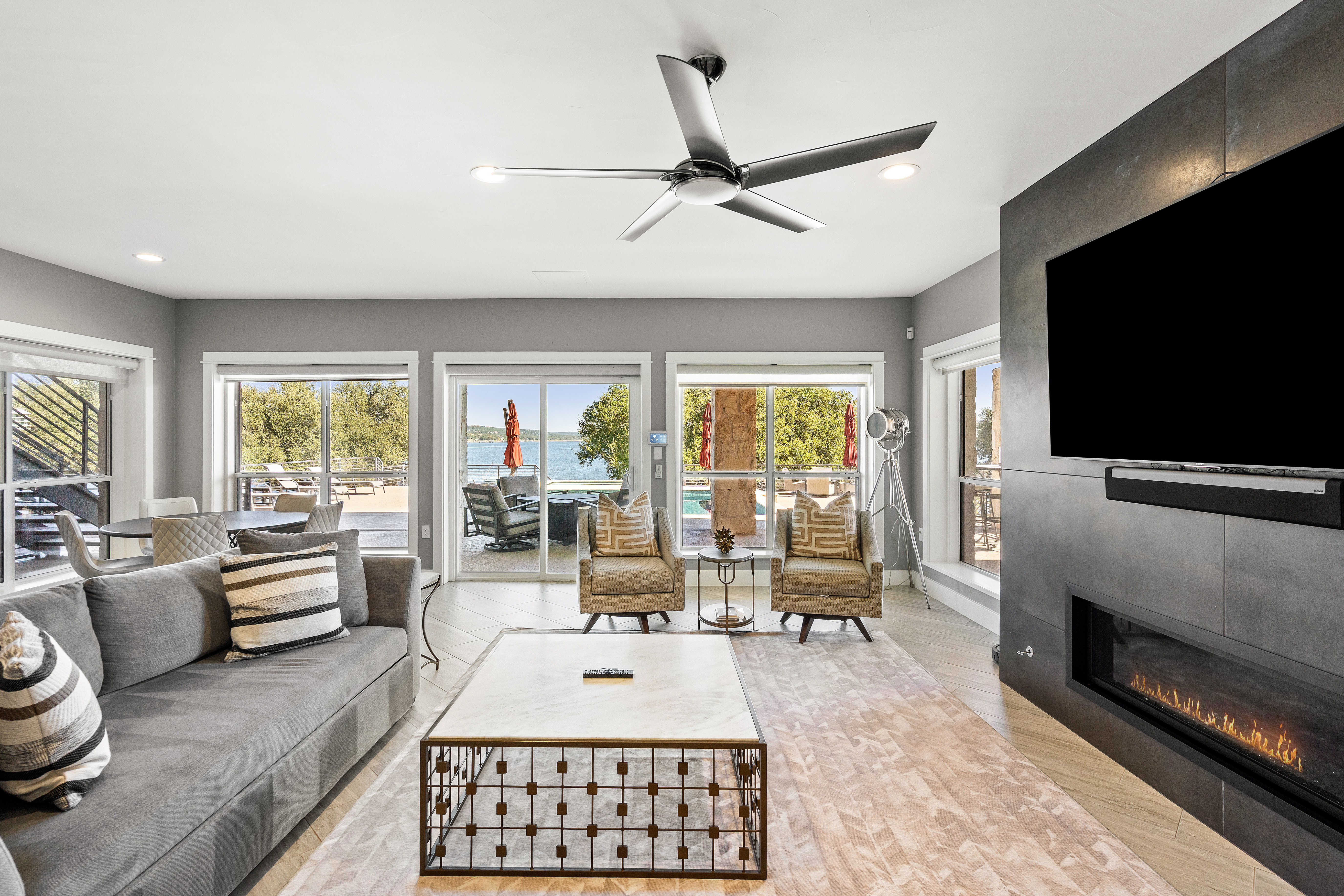 15210 Rainbow 1 Street Austin, TX 78734 - Photo 79 of 138 a living room with furniture and a flat screen tv