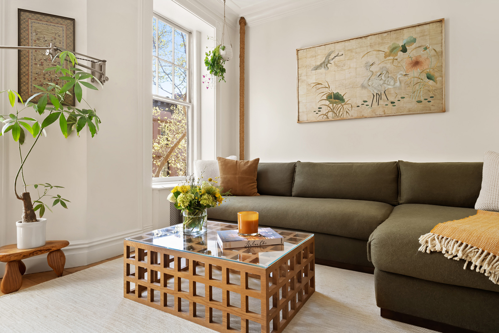 67 Perry Street, Unit 3 Manhattan, NY 10014 - Photo 6 of 22 a living room with furniture a couch and a potted plant