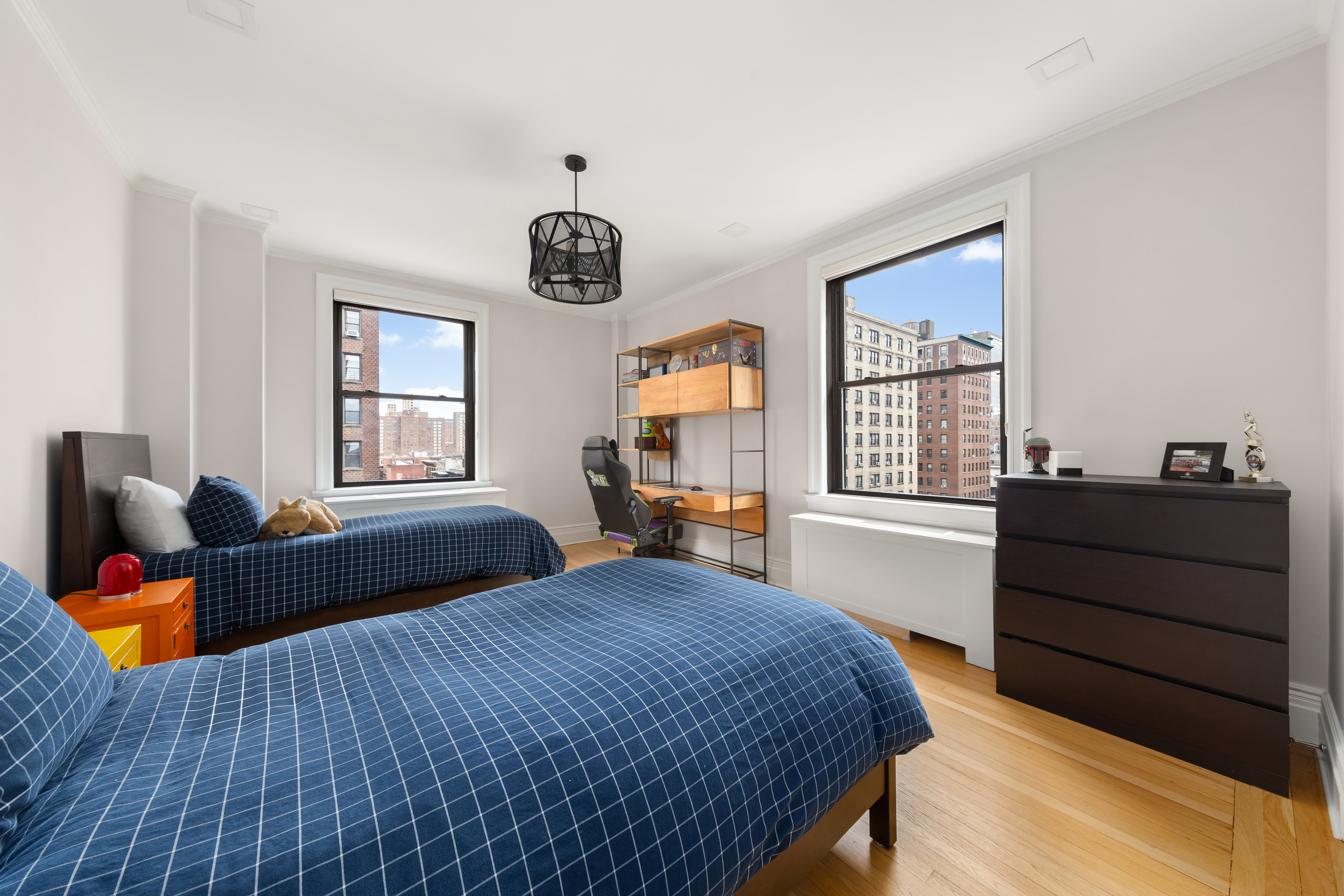 905 West End Avenue, Unit 81 Manhattan, NY 10025 - Photo 8 of 14 a bedroom with a bed and window