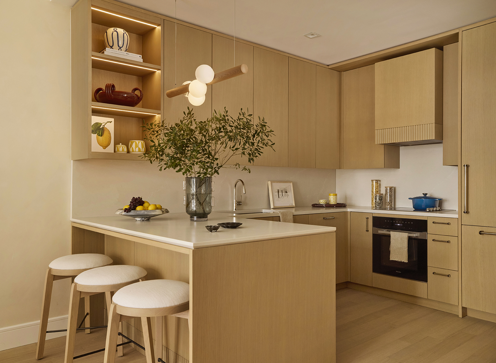 201 East 23rd Street, Unit 6A Manhattan, NY 10010 - Photo 4 of 25 a kitchen with stainless steel appliances granite countertop a stove a sink and a refrigerator