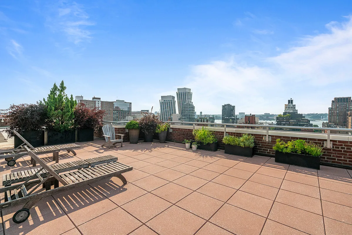 360 West 22nd Street, Unit 12L Manhattan, NY 10011 - Photo 20 of 21 a view of a terrace with chairs