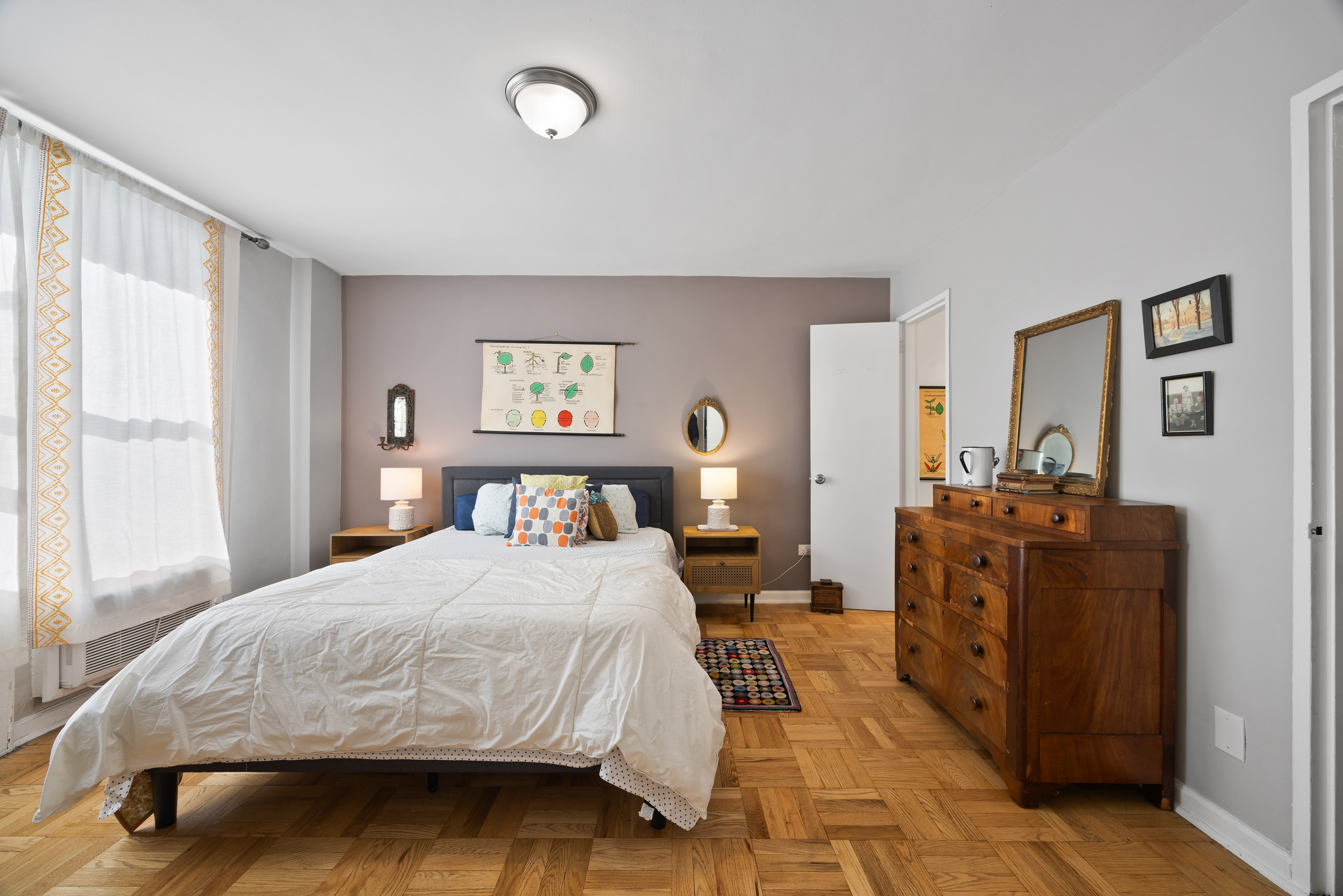 255 Fieldston Terrace, Unit 2L Bronx, NY 10471 - Photo 18 of 32 a bedroom with a bed and window