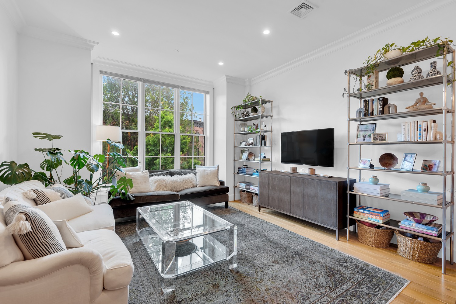 84 Lefferts Place, Unit 3B Brooklyn, NY 11238 - Photo 4 of 12 a living room with furniture and a flat screen tv
