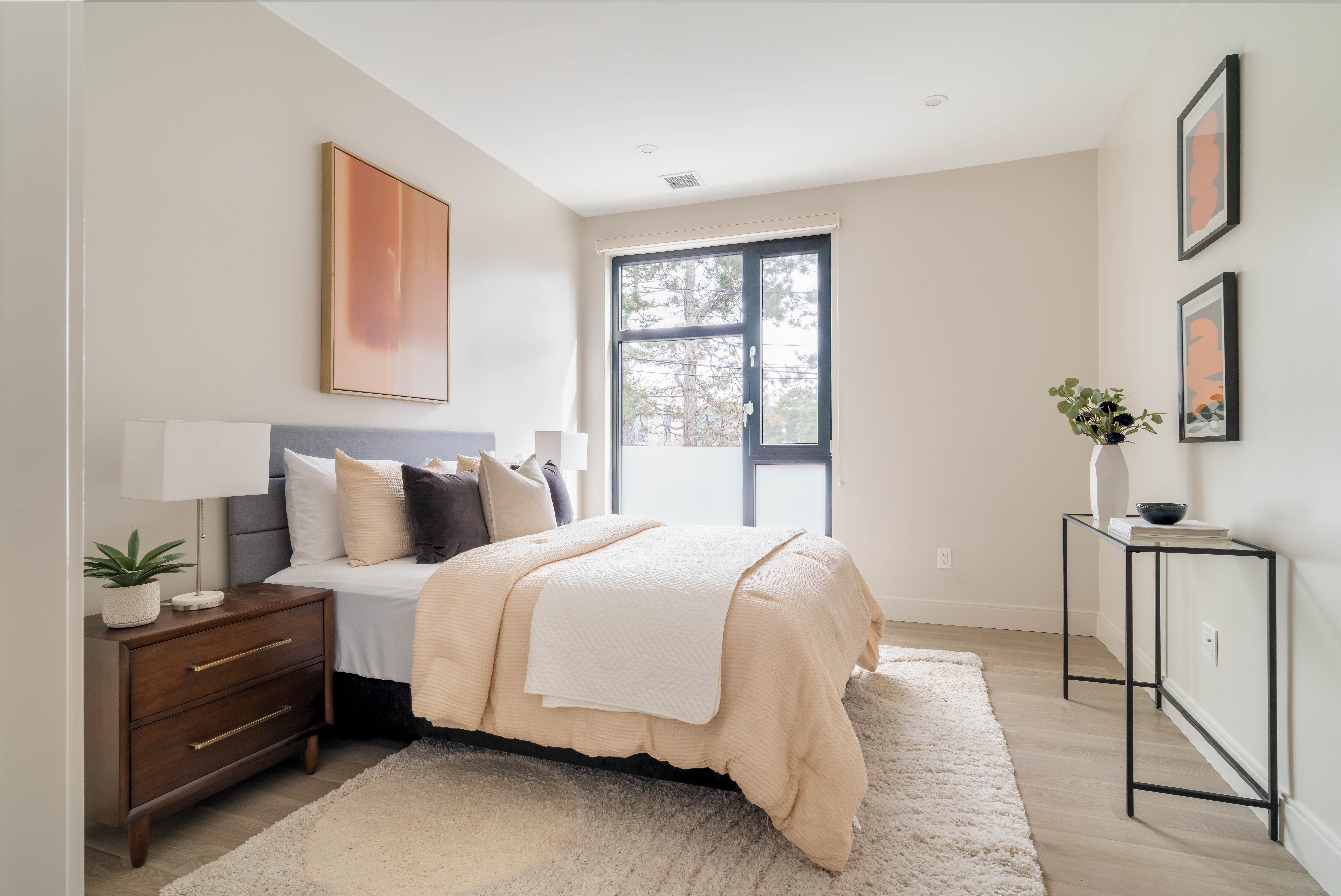 85 Myrtle Street, Unit 110 Quincy, MA 02171 - Photo 7 of 13 a bedroom with bed and window