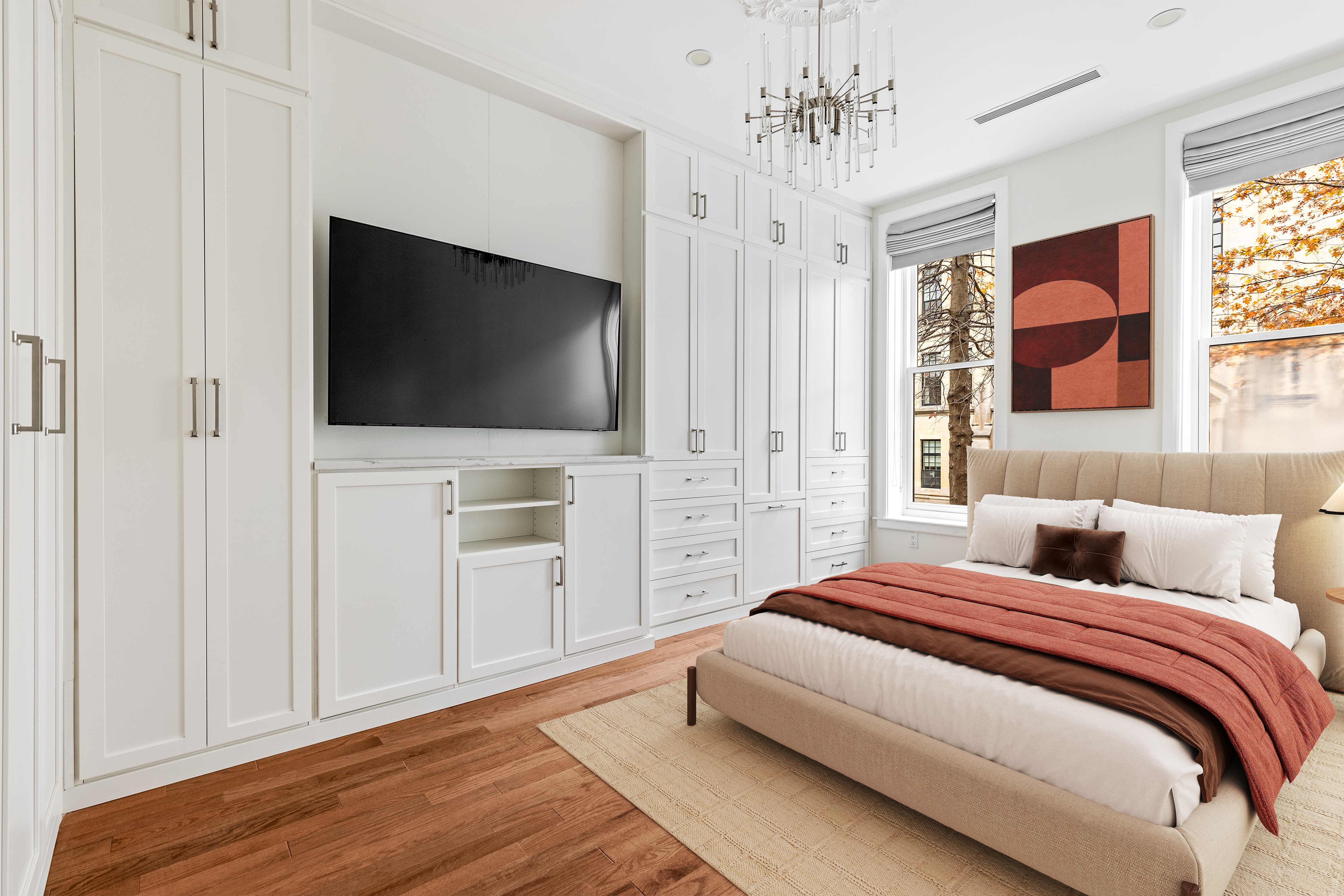 185 Bainbridge Street Brooklyn, NY 11233 - Photo 14 of 23 a spacious bedroom with a bed and a flat screen tv