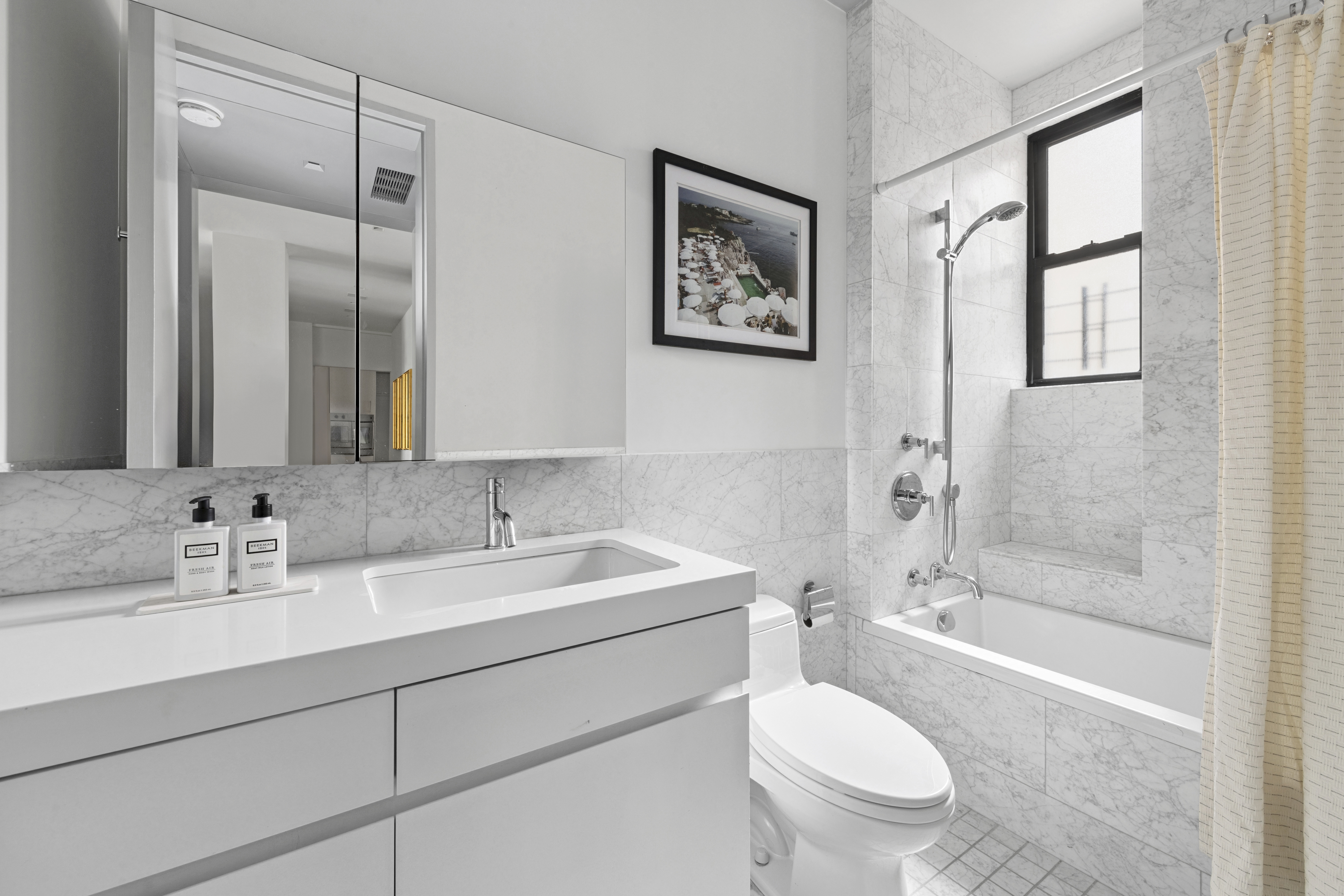 215 West 90th Street, Unit 10A Manhattan, NY 10024 - Photo 10 of 14 a bathroom with a sink toilet and shower