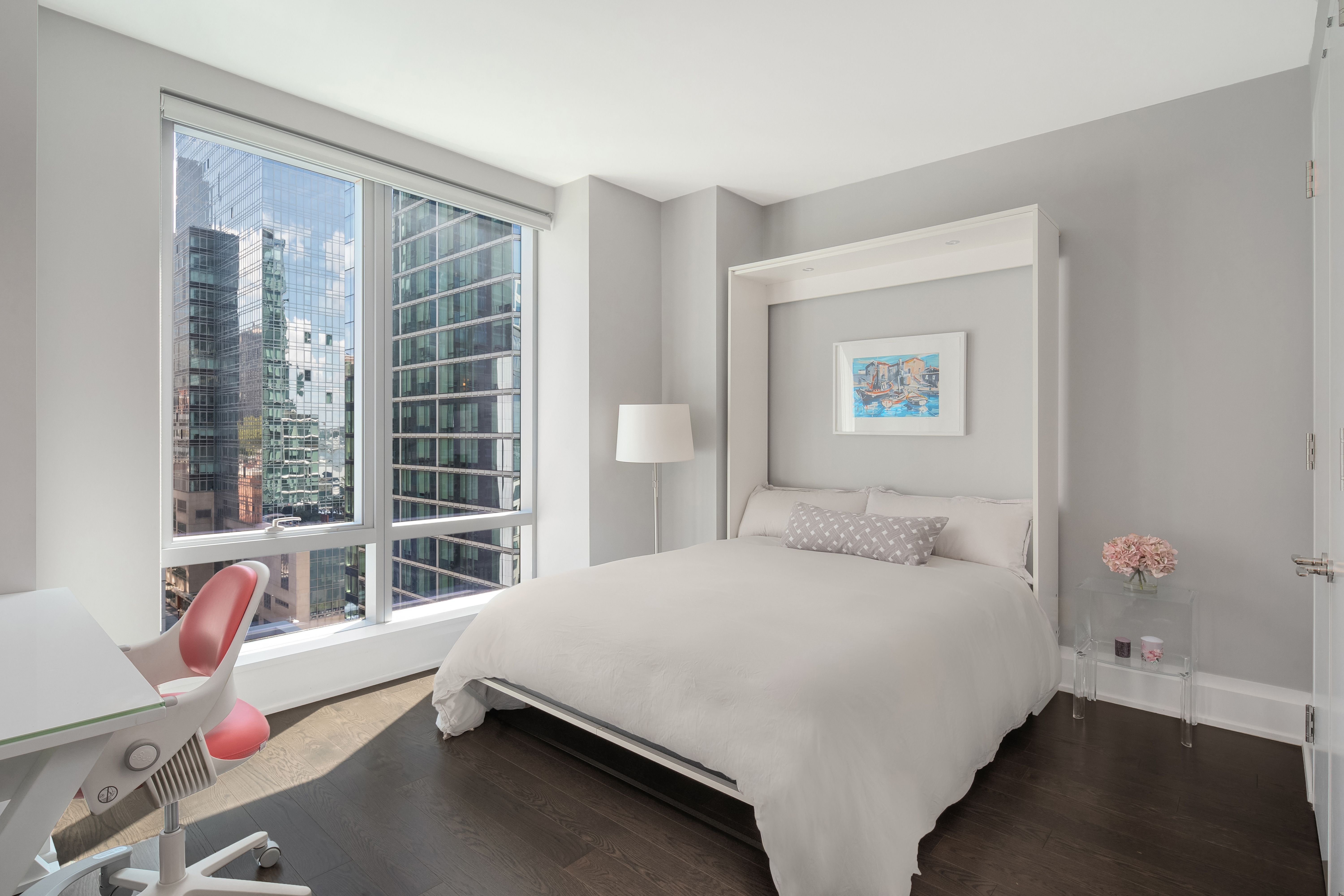 50 Riverside Boulevard, Unit 10P Manhattan, NY 10069 - Photo 13 of 21 a bedroom with a bed and a window