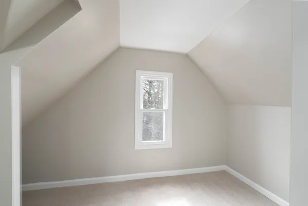 an empty room with a window