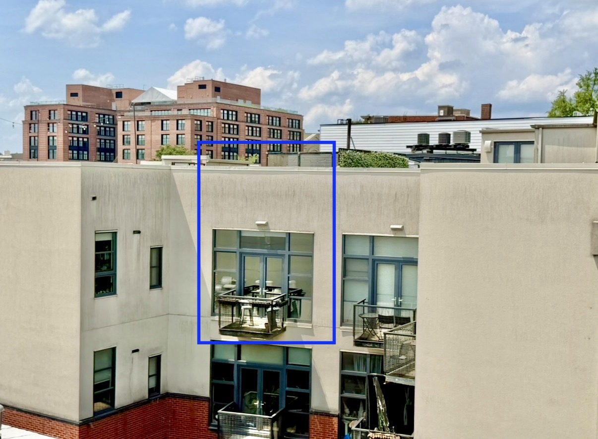 2426 Ontario Road Northwest, Unit 401 Washington, DC 20009 - Photo 7 of 28 a front view of a multi story building