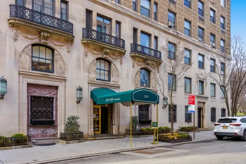 a view of a building with a street