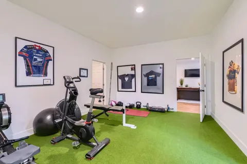 a view of a workspace with gym equipment