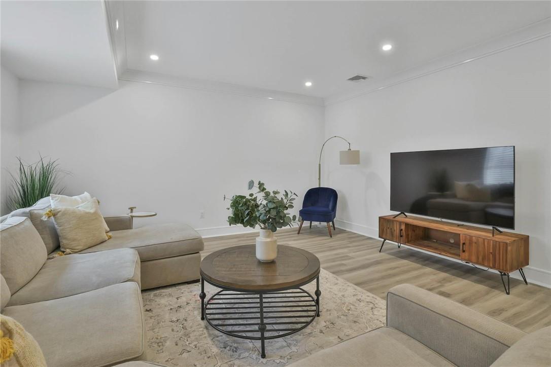 211 Purchase Street, Unit A Rye, NY 10580 - Photo 18 of 22 a living room with furniture and a flat screen tv