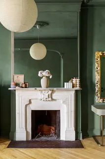 a view of fireplace and window