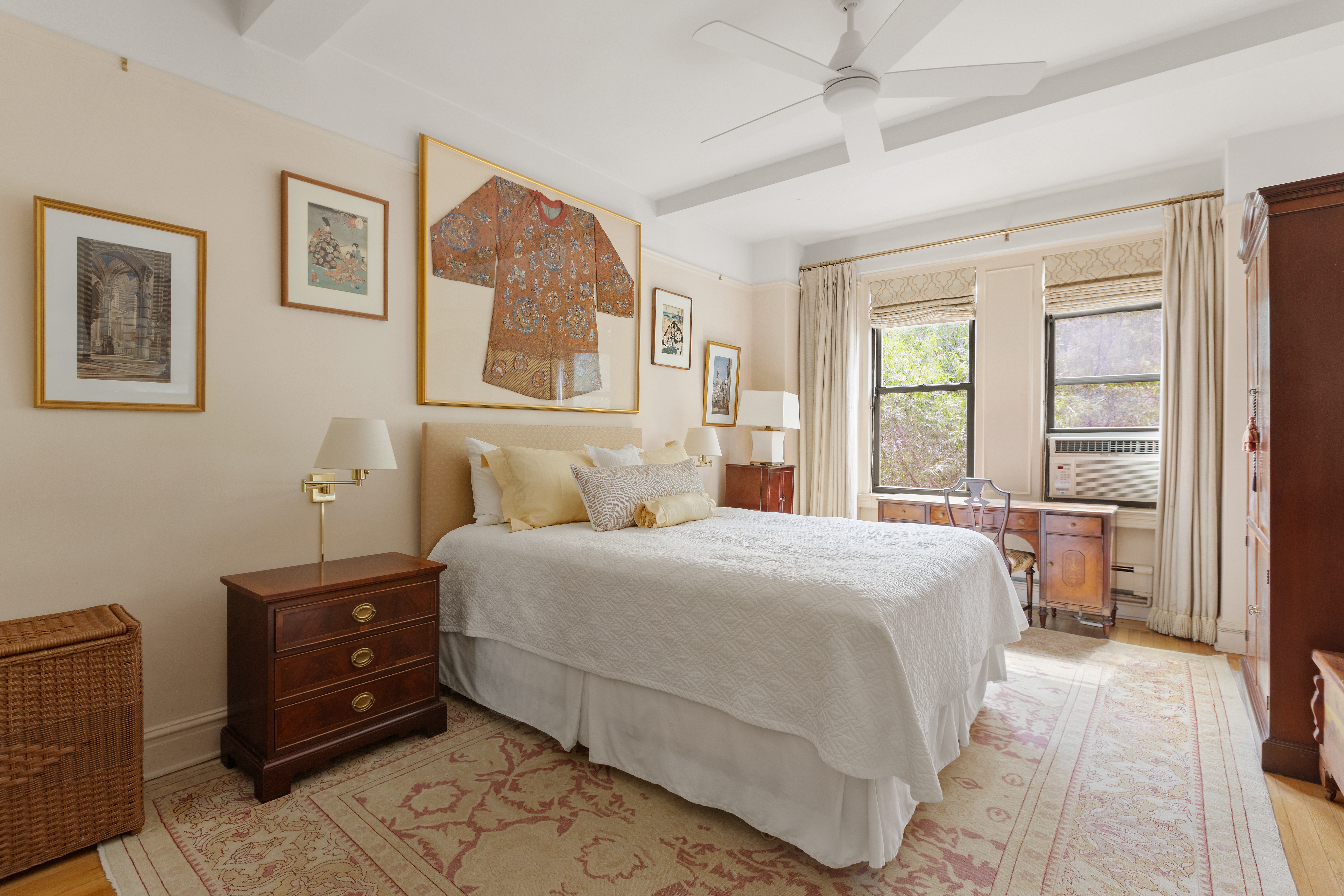 41 West 96th Street, Unit 4B Manhattan, NY 10025 - Photo 8 of 15 a bedroom with a bed and wooden floor