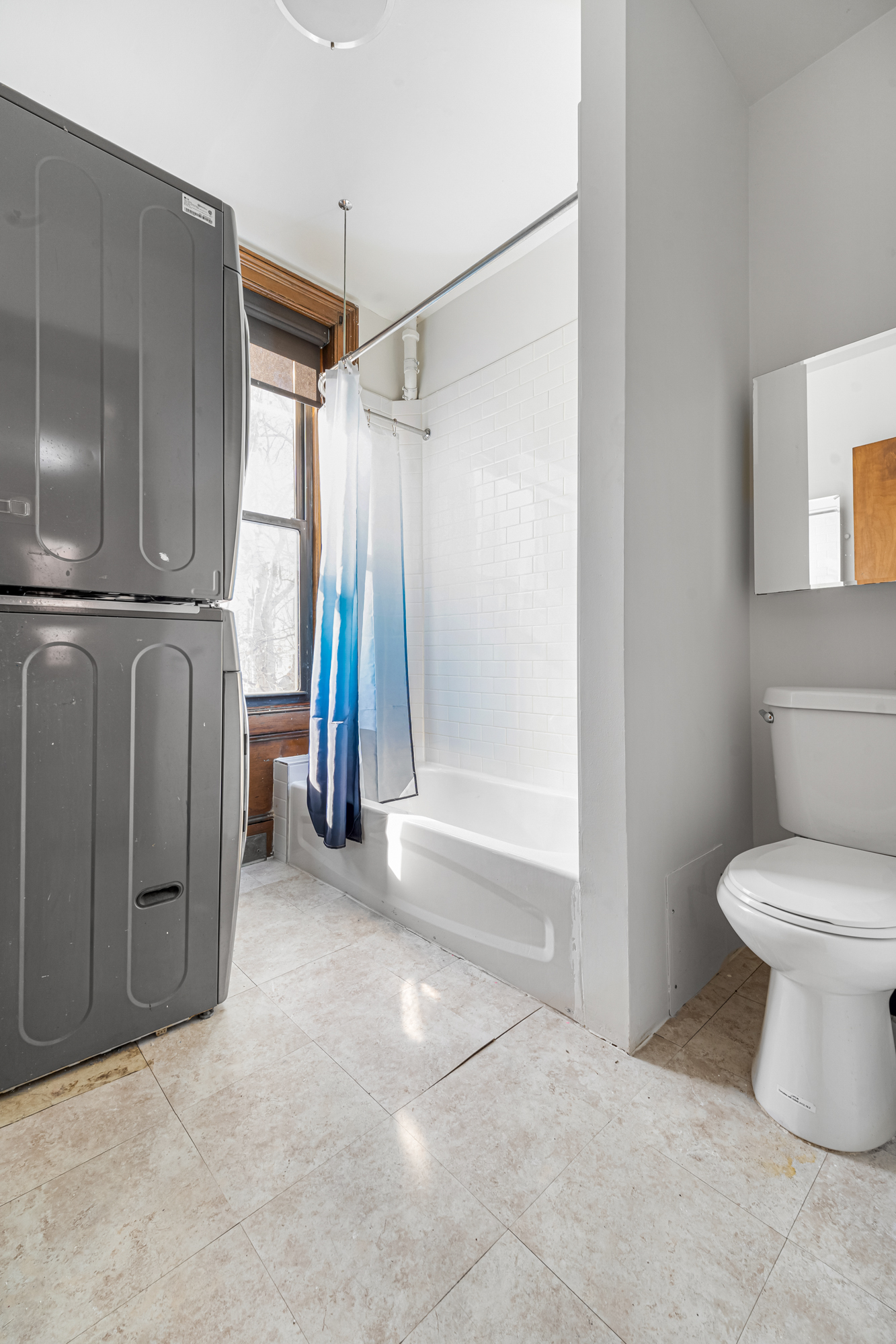 458 West 153rd Street Manhattan, NY 10031 - Photo 14 of 21 a bathroom with a shower and a toilet