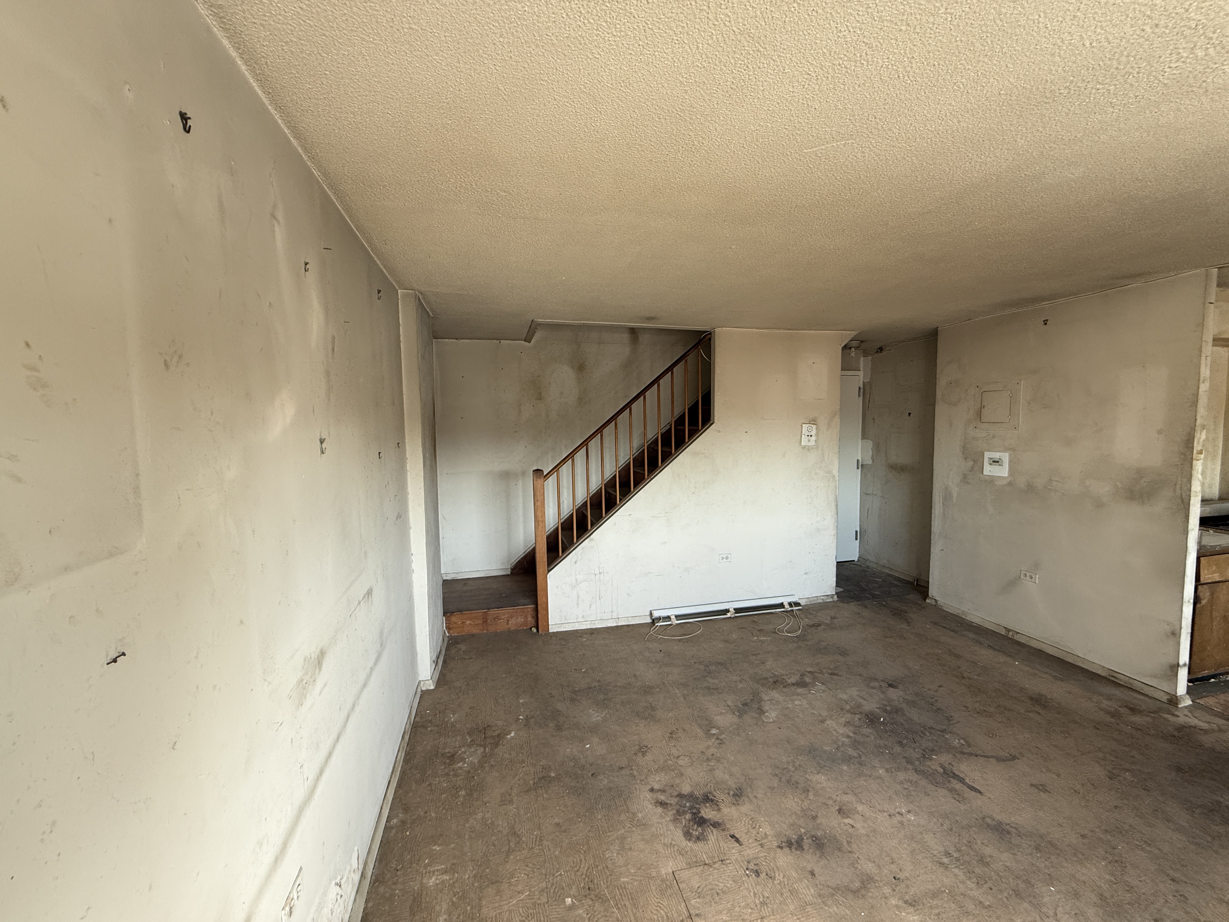 609 Columbus Avenue, Unit 14F Manhattan, NY 10024 - Photo 2 of 6 a view of an empty room with stairs