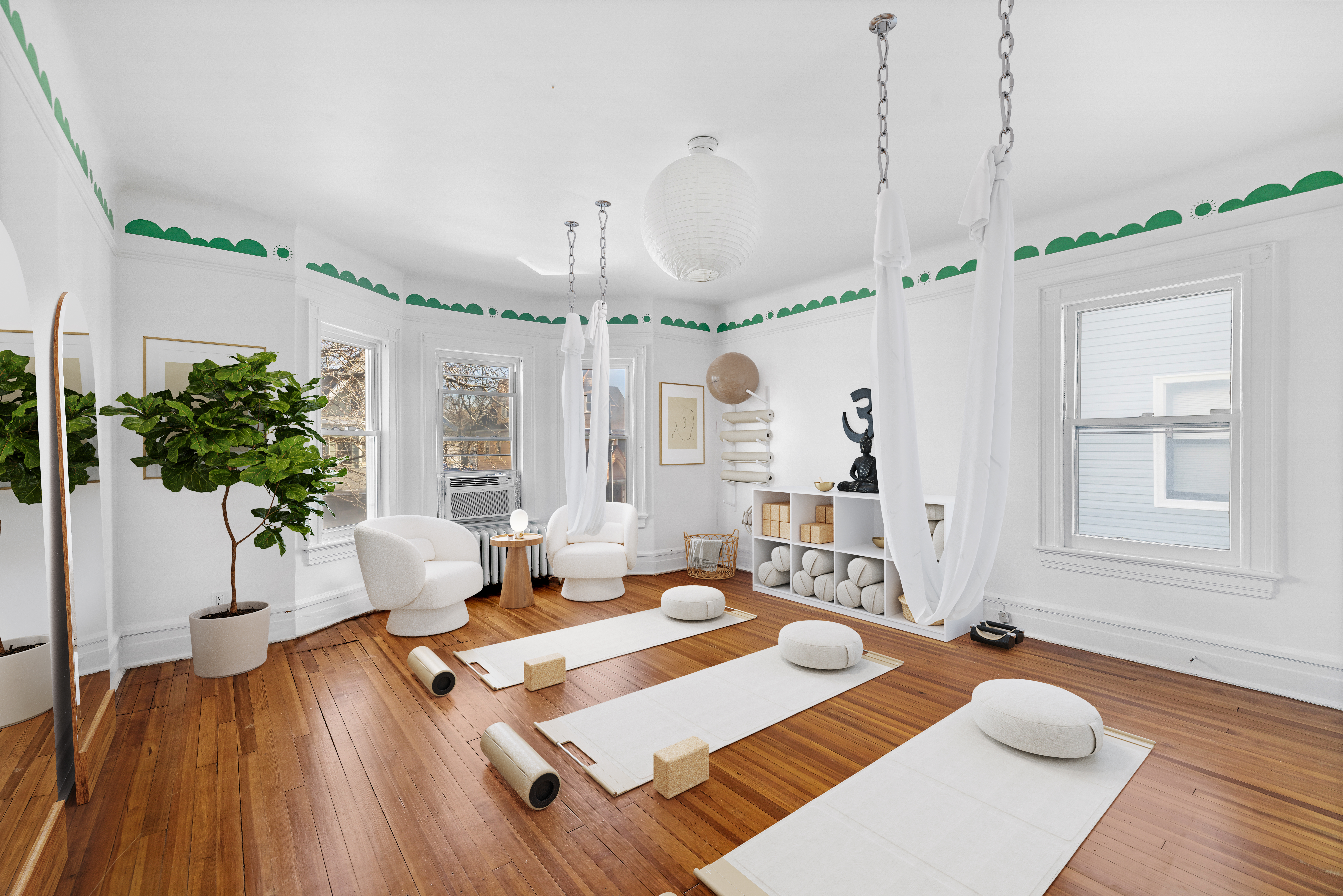 792 East 21st Street Brooklyn, NY 11210 - Photo 17 of 29 a living room with furniture and a chandelier