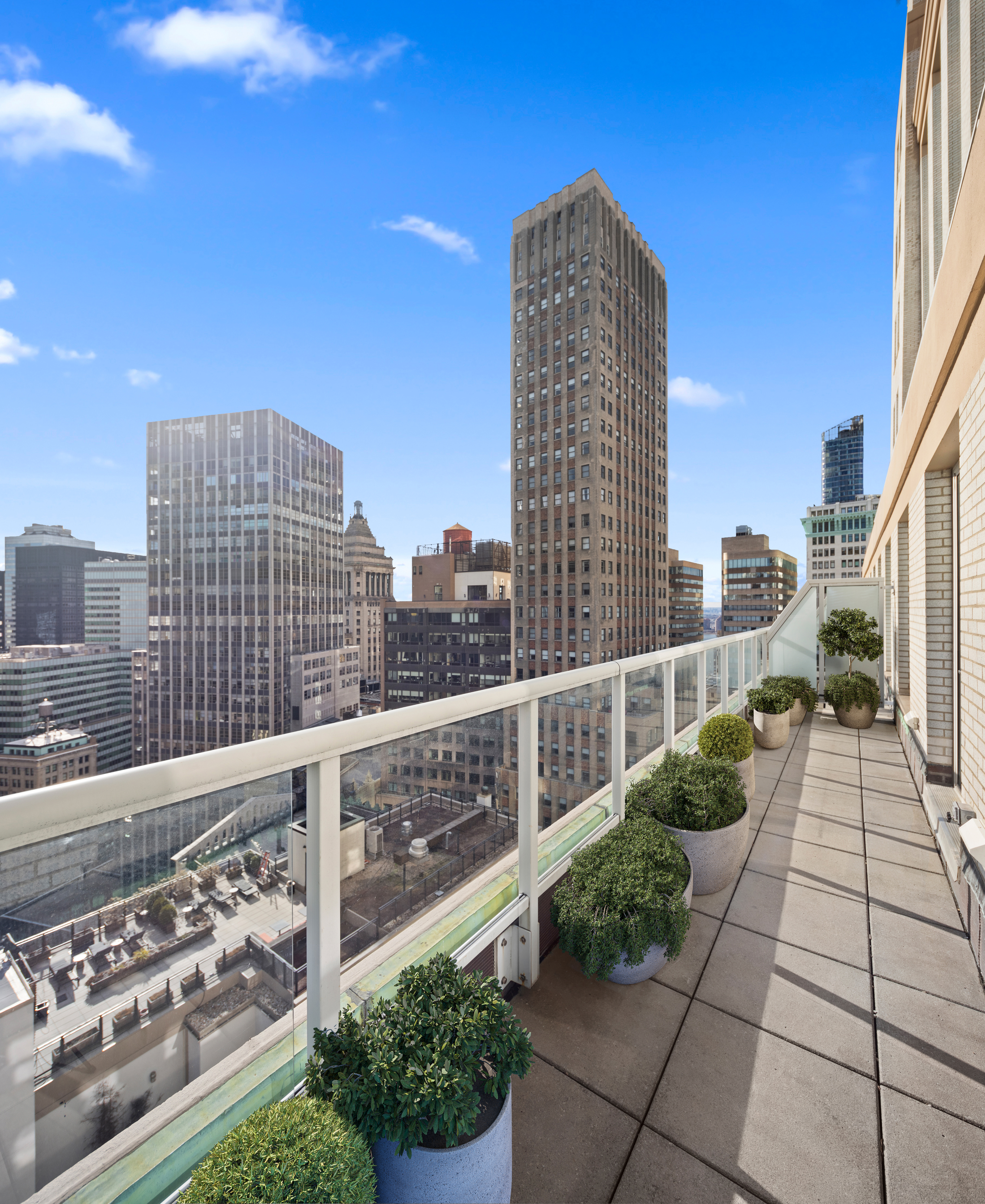 15 Broad Street, Unit 2926 Manhattan, NY 10005 - Photo 3 of 26 a view of city from a balcony