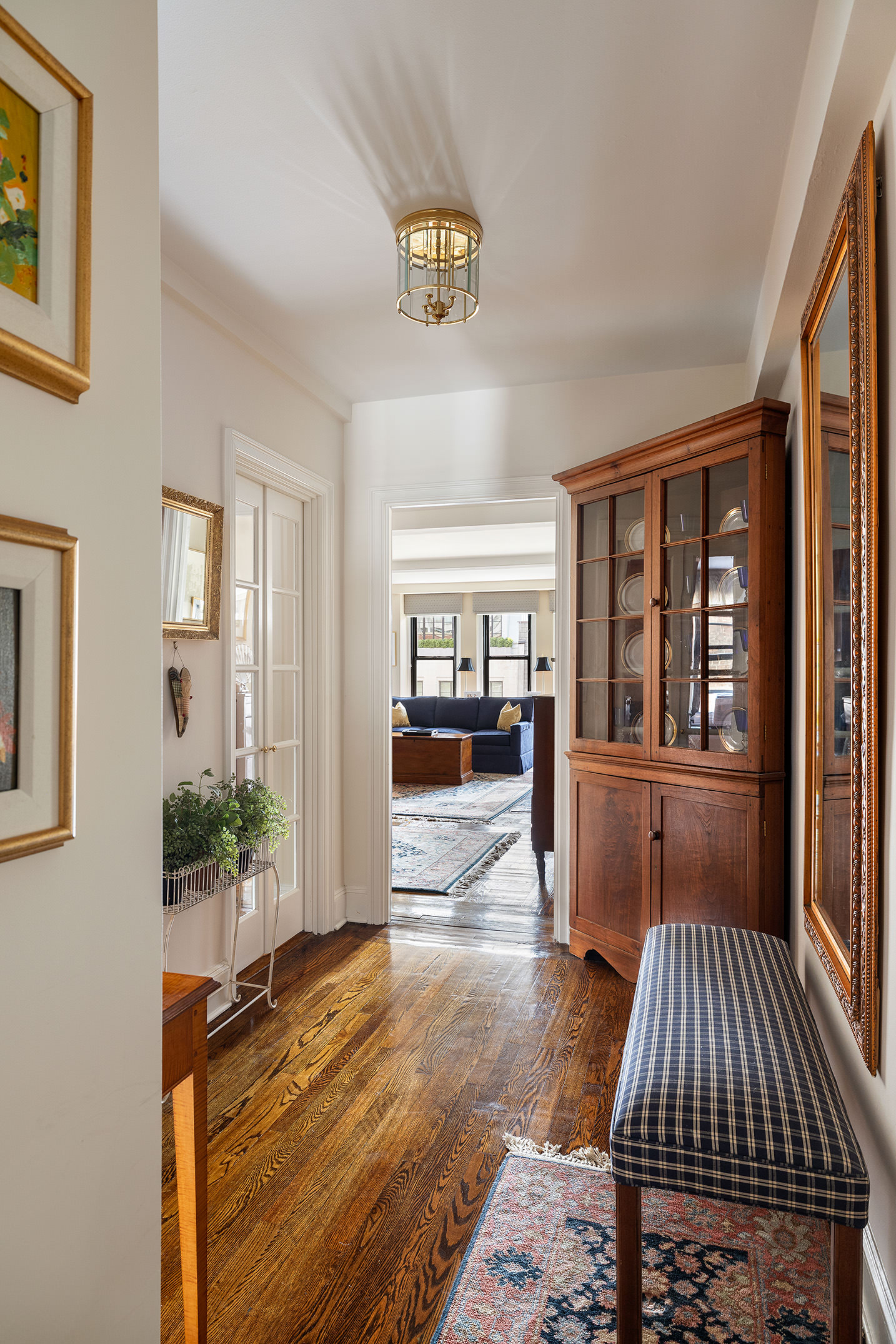 151 East 83rd Street, Unit 6D Manhattan, NY 10028 - Photo 11 of 14 a view of livingroom with furniture and staircase