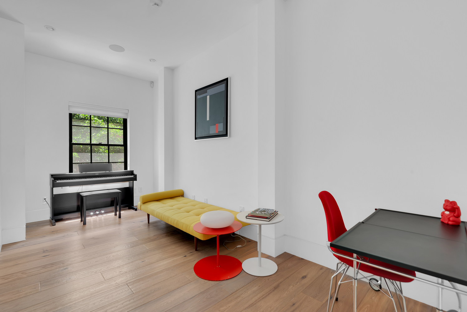 440 West 20th Street Manhattan, NY 10011 - Photo 16 of 20 a living room with furniture and wooden floor