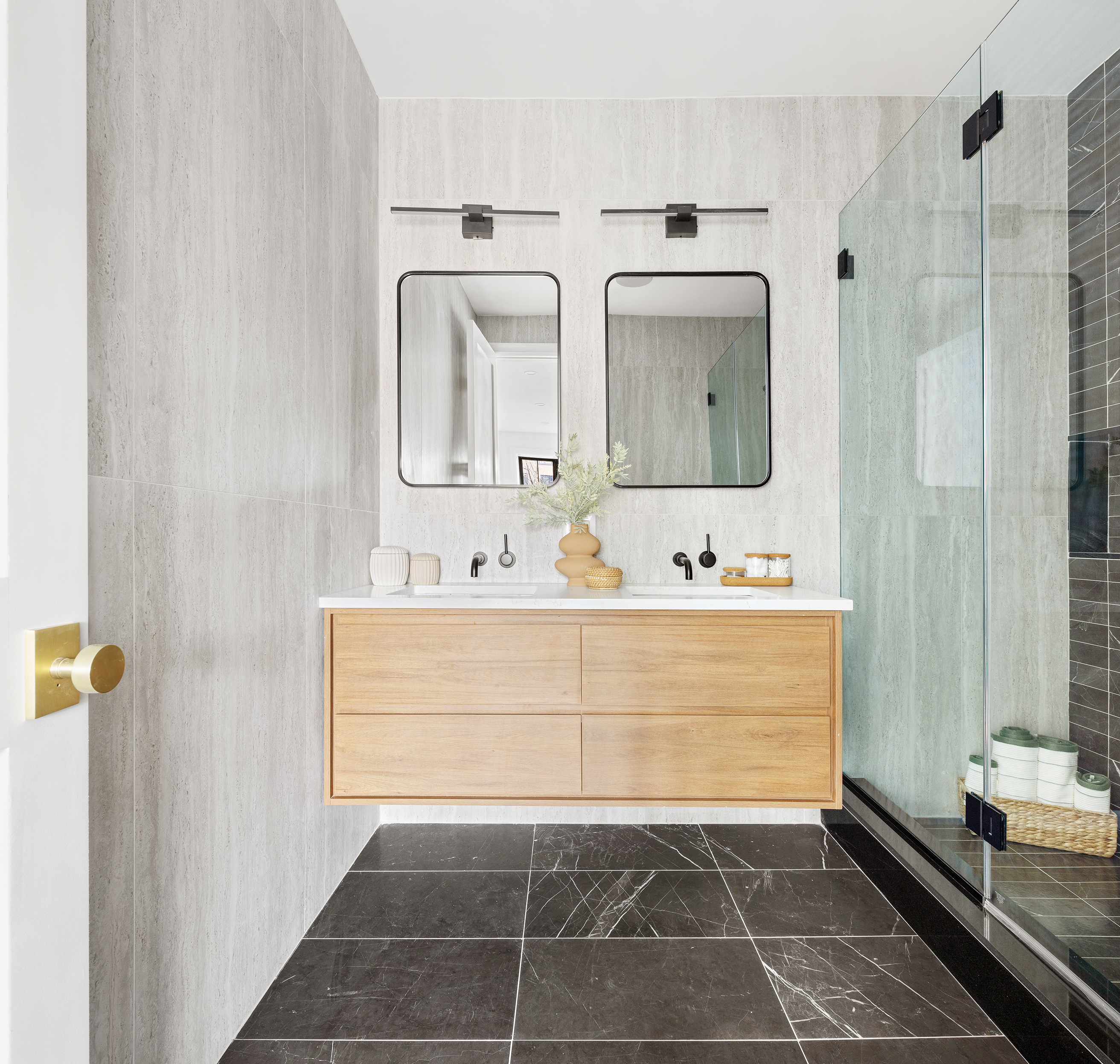 557 Saint Marks Avenue Brooklyn, NY 11216 - Photo 9 of 13 a bathroom with a sink a mirror and shower