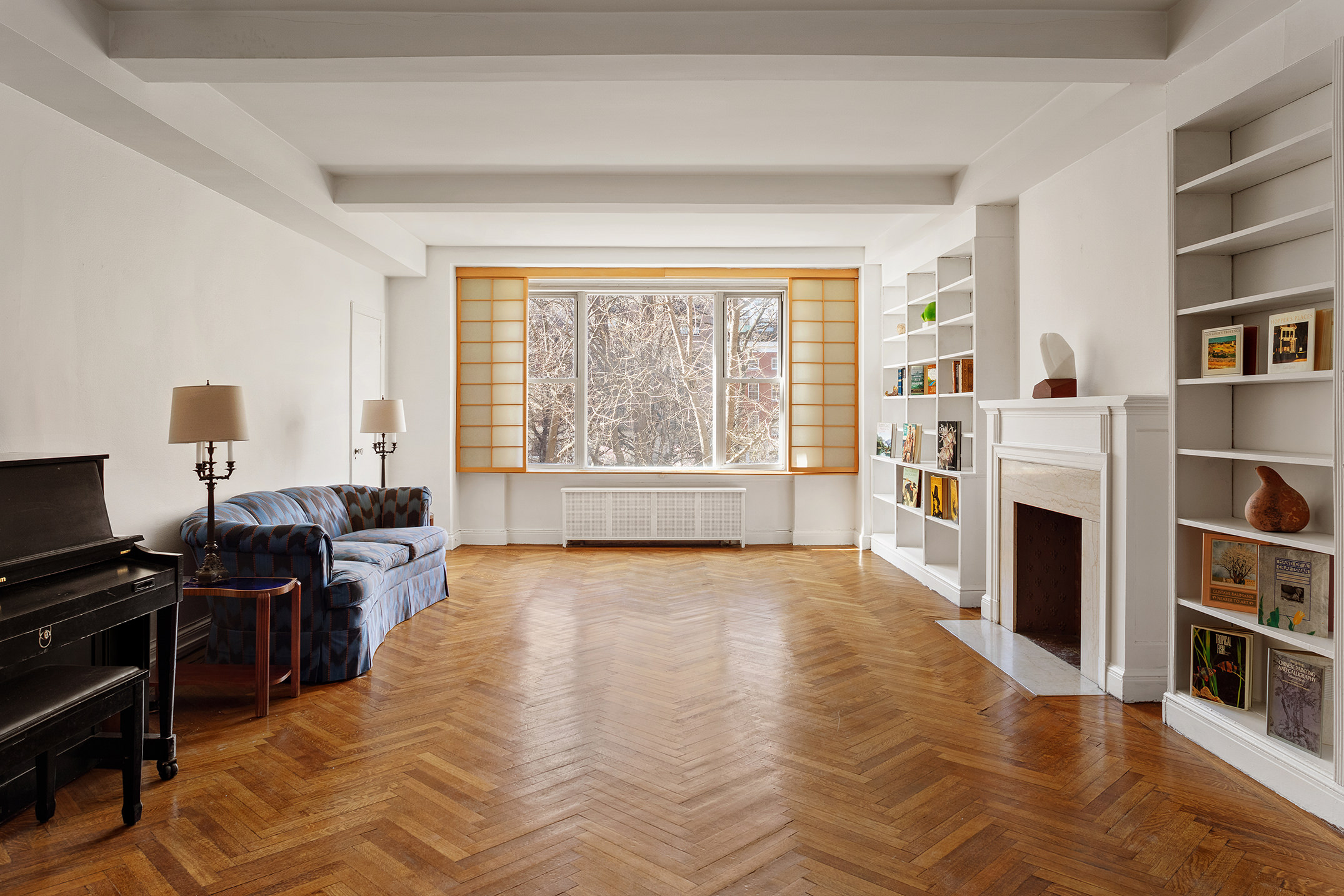 45 Gramercy Park North, Unit 4B Manhattan, NY 10010 - Photo 3 of 13 a view of a livingroom with furniture and a fireplace