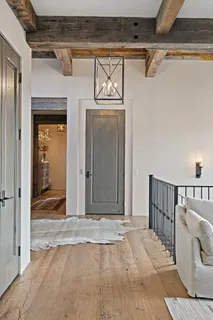 a bathroom with a bathtub and window